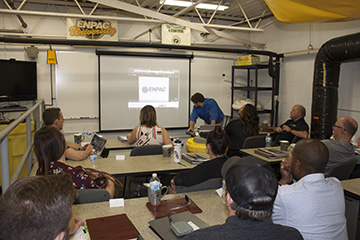 People sitting in classroom.