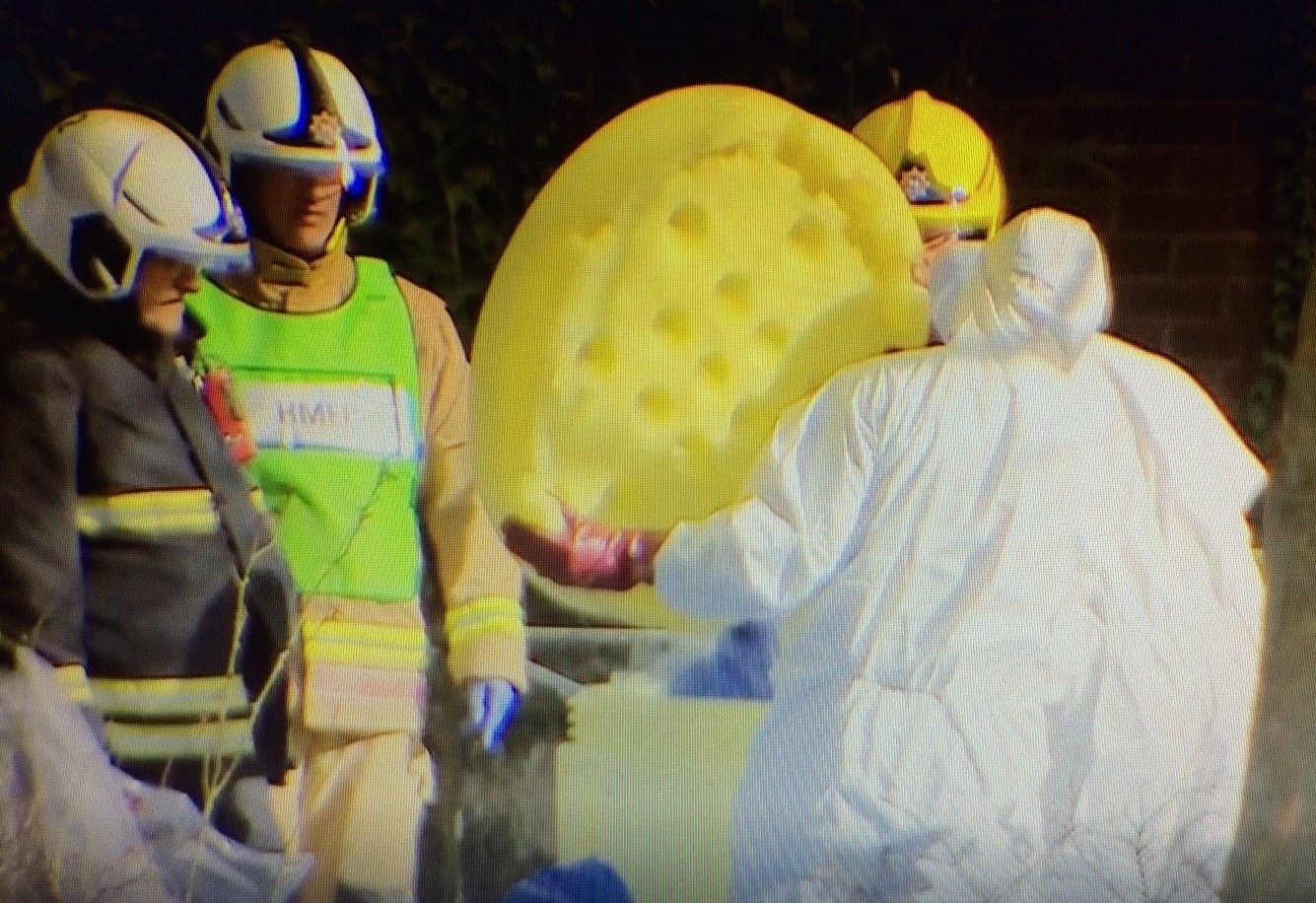 People cleaning up after Salisbury poison attack.